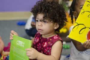 Toddler with Book